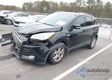 2016 Ford Escape Titanium z USA, uszkodzony, nr VIN 1FMCU0JX6GUB79270